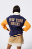 NY Knicks Colorblock Quarter Zip Sweatshirt in Blue, Orange and Cream